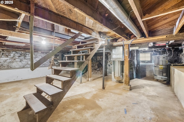 601 Mcclaine St, Silverton, OR 97381 - below grade area featuring strapped water heater and stairs