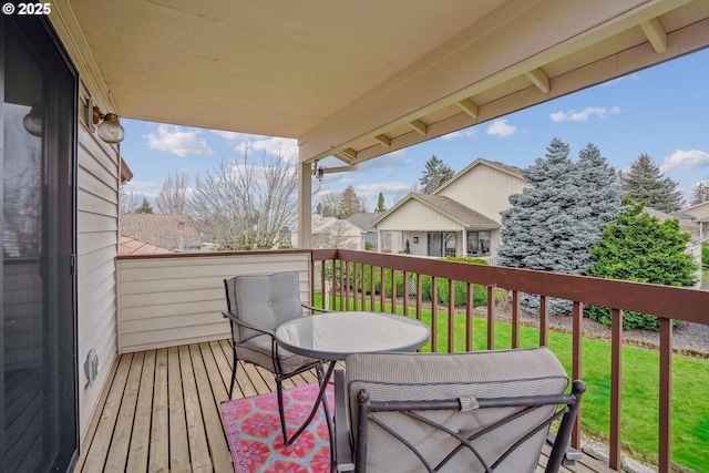 deck featuring a lawn