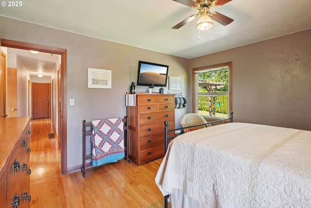 11731 SE 35th Ave, Milwaukie, OR 97222 - bedroom featuring light wood-style flooring and a ceiling fan