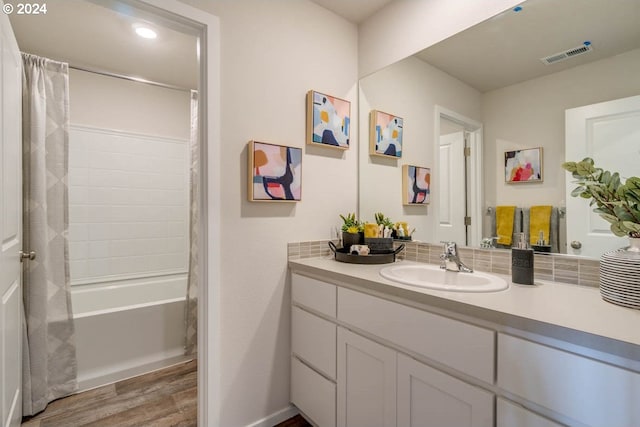2891 V St, Springfield, OR 97477 - full bathroom with wood finished floors, vanity, and shower / bath combination with curtain