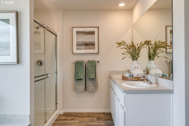 2891 V St, Springfield, OR 97477 - full bathroom with wood finished floors, a shower stall, and double vanity