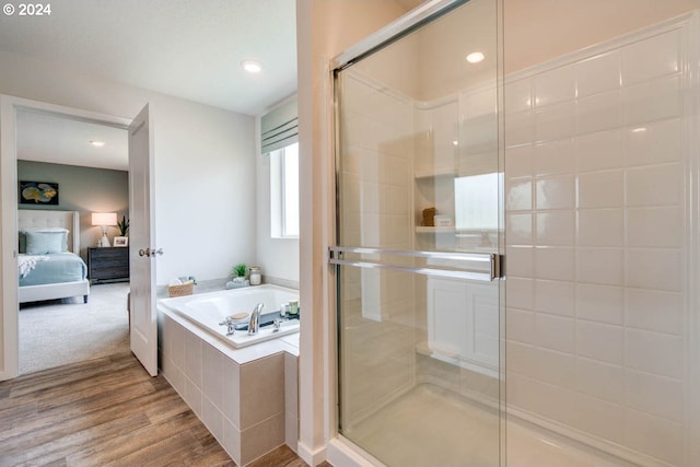 2891 V St, Springfield, OR 97477 - ensuite bathroom featuring a garden tub, a stall shower, wood finished floors, and recessed lighting