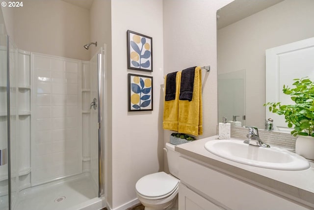 2891 V St, Springfield, OR 97477 - full bathroom with a stall shower, vanity, and toilet