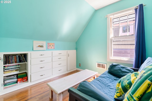 2406 SE 30th Ave, Portland, OR 97214 - bedroom featuring vaulted ceiling and wood finished floors