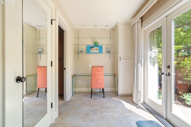 2406 SE 30th Ave, Portland, OR 97214 - doorway with healthy amount of natural light, track lighting, french doors, and concrete floors