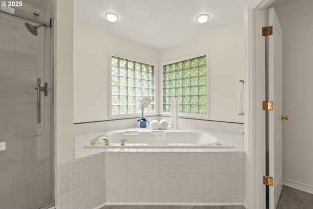 13460 Snowberry Ct, Lake Oswego, OR 97035 - full bathroom featuring a bath, healthy amount of natural light, and a stall shower