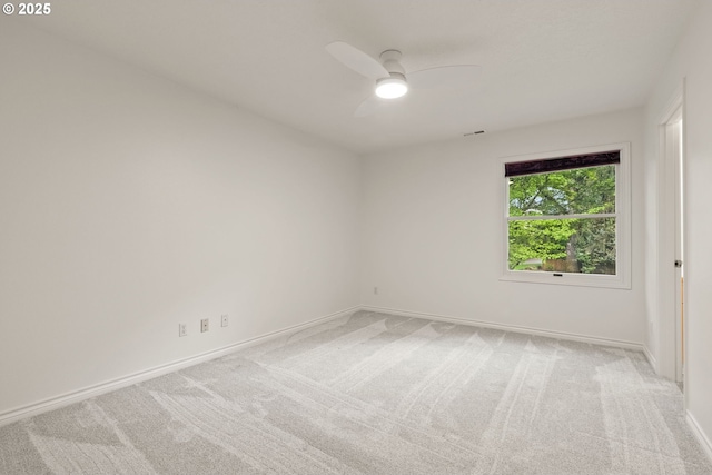 13460 Snowberry Ct, Lake Oswego, OR 97035 - unfurnished room featuring a ceiling fan, baseboards, and light colored carpet