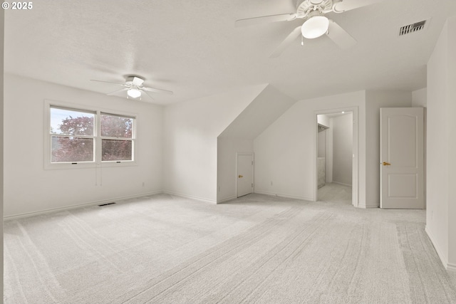13460 Snowberry Ct, Lake Oswego, OR 97035 - additional living space with a ceiling fan, light carpet, and baseboards