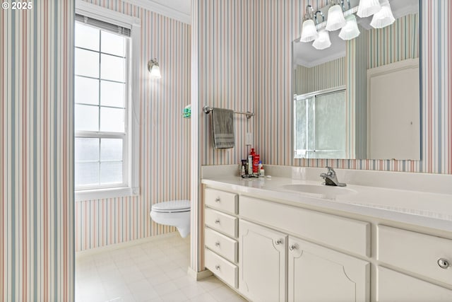 full bath with toilet, vanity, an inviting chandelier, an enclosed shower, and wallpapered walls