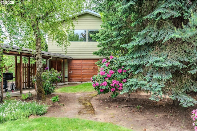 1214 SE 179th Ave, Portland, OR 97233 - view of yard featuring an attached garage