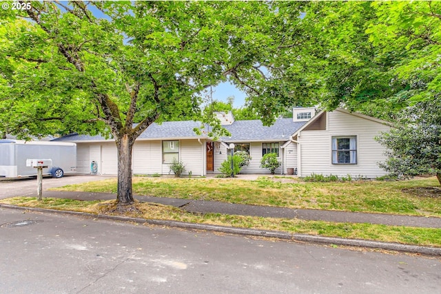 15940 SW 88th Ave, Tigard, OR 97224 - view of front of home featuring driveway, an attached garage, and a shingled roof