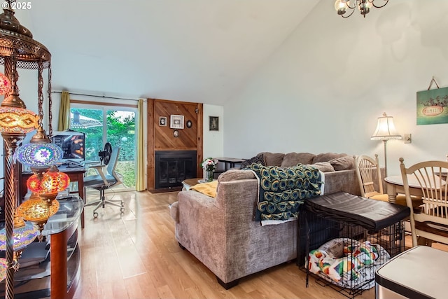 15940 SW 88th Ave, Tigard, OR 97224 - living room with light wood-style flooring, high vaulted ceiling, and a fireplace
