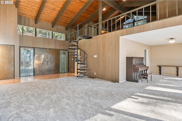 interior space with beam ceiling, wood ceiling, and high vaulted ceiling