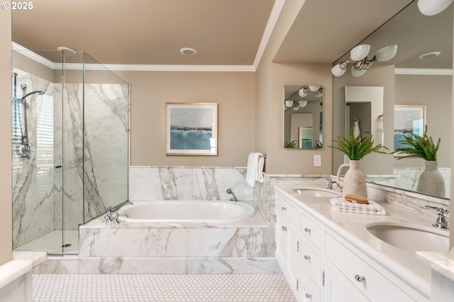 bathroom featuring crown molding, vanity, and shower with separate bathtub