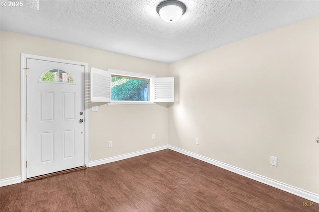 25125 SE Treehill Ln, Damascus, OR 97089 - entryway with wood finished floors and a textured ceiling