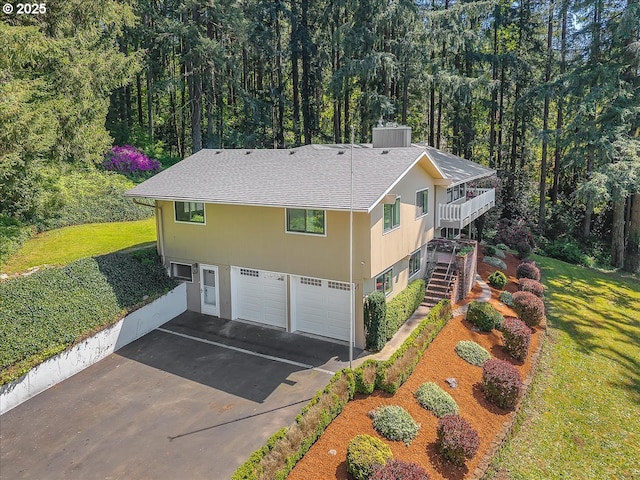 aerial view featuring a view of trees