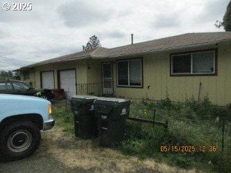 646/648 W Sixth Ave, Sutherlin, OR 97479 - view of front of property featuring a garage