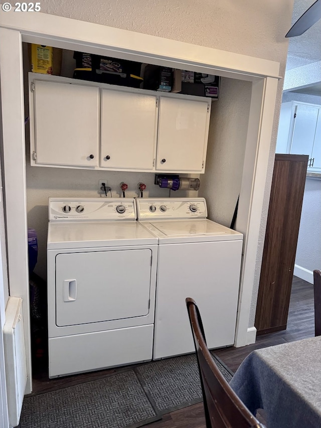 1918 Chestnut St, Baker City, OR 97814 - laundry room featuring cabinet space, washing machine and clothes dryer, dark wood-style floors, and a textured wall