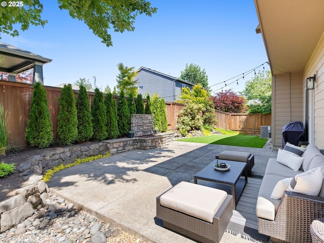 15582 SE Owl Ln, Happy Valley, OR 97015 - fenced backyard with a patio, cooling unit, and an outdoor hangout area