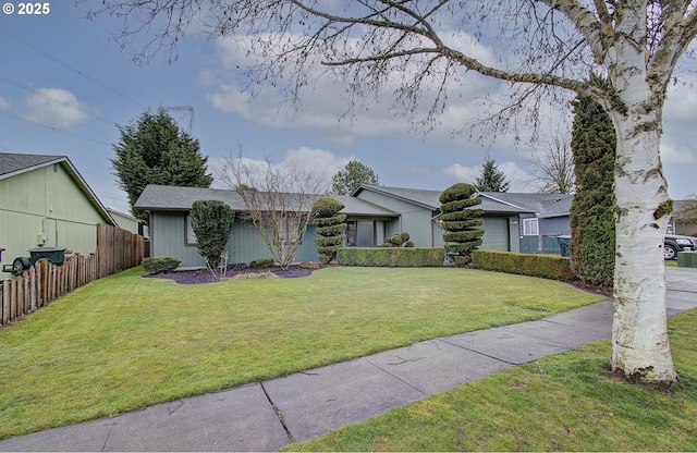 ranch-style home with a front yard