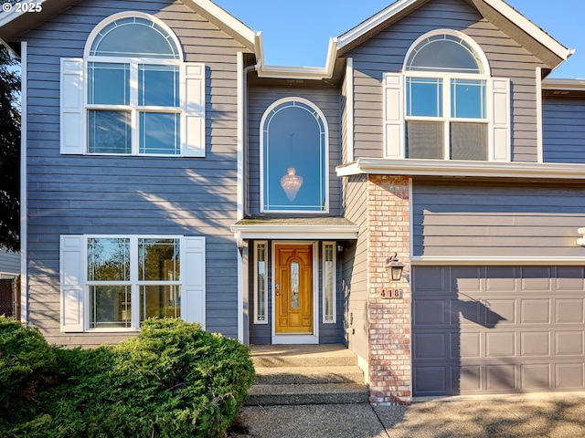 view of front of property featuring a garage