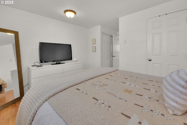 921 Williams St, Eugene, OR 97402 - bedroom featuring wood finished floors and a closet