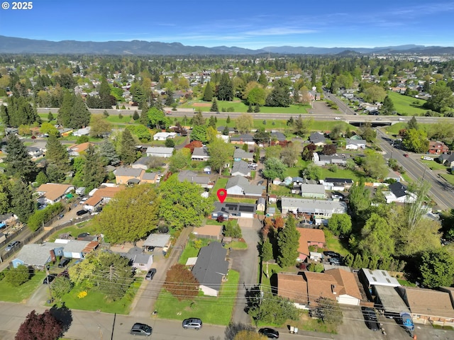 921 Williams St, Eugene, OR 97402 - aerial overview of property's location with a mountainous background and nearby suburban area