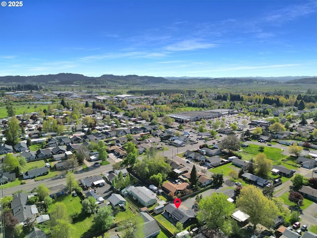 921 Williams St, Eugene, OR 97402 - aerial view of property and surrounding area featuring a mountainous background and nearby suburban area