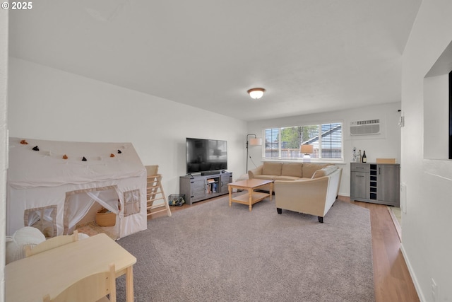921 Williams St, Eugene, OR 97402 - living room featuring light wood-style floors and a wall unit AC