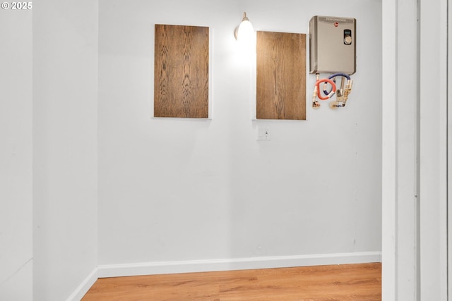 2801 Kincaid St, Eugene, OR 97405 - spare room featuring baseboards and wood finished floors