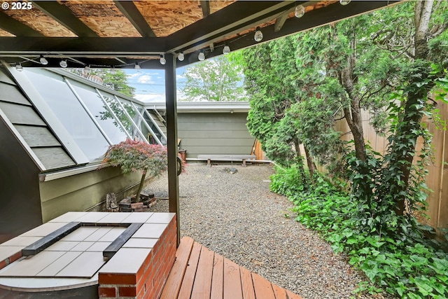 2801 Kincaid St, Eugene, OR 97405 - wooden terrace with a fenced backyard