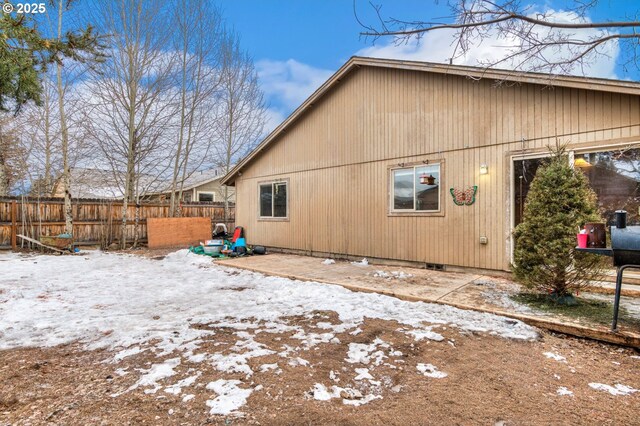 view of snow covered property