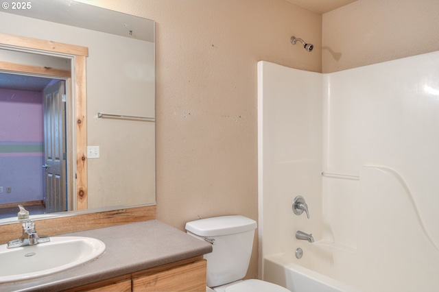 full bathroom featuring vanity, toilet, and bathing tub / shower combination