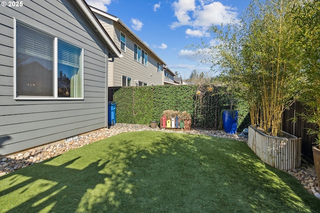 view of yard featuring fence