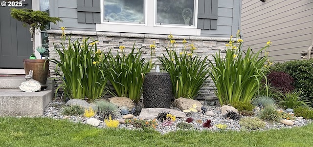 details featuring stone siding