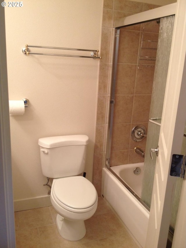 844 SW Broadway Dr Unit 3, Portland, OR 97201 - bathroom with toilet, tile patterned floors, shower / bathtub combination, and baseboards