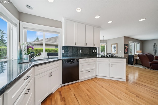 2678 SE Myrtlewood Way, Gresham, OR 97080 - kitchen with dishwasher, a sink, light wood-style flooring, white cabinetry, and open floor plan