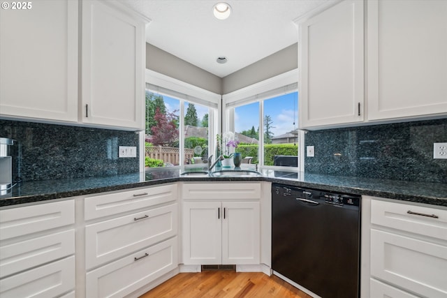 2678 SE Myrtlewood Way, Gresham, OR 97080 - kitchen featuring black dishwasher, a sink, light wood finished floors, white cabinets, and recessed lighting