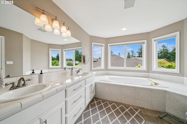 2678 SE Myrtlewood Way, Gresham, OR 97080 - full bath with double vanity, a bath, and plenty of natural light