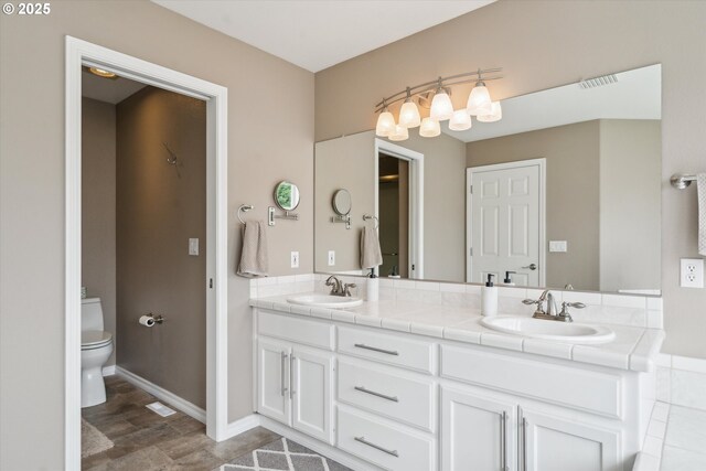 2678 SE Myrtlewood Way, Gresham, OR 97080 - full bathroom featuring double vanity and toilet