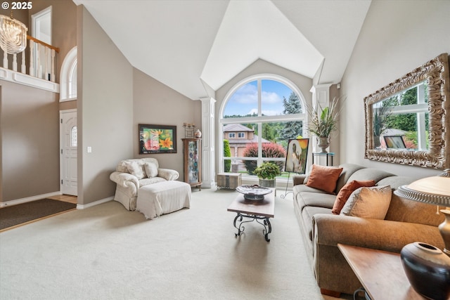 2678 SE Myrtlewood Way, Gresham, OR 97080 - carpeted living area with ornate columns, high vaulted ceiling, and baseboards