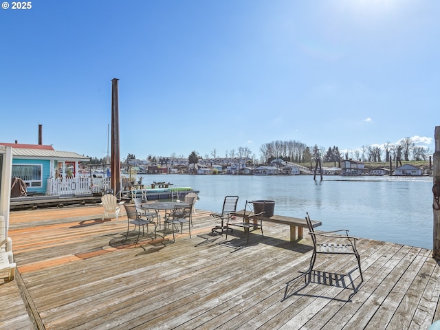 view of dock with a water view