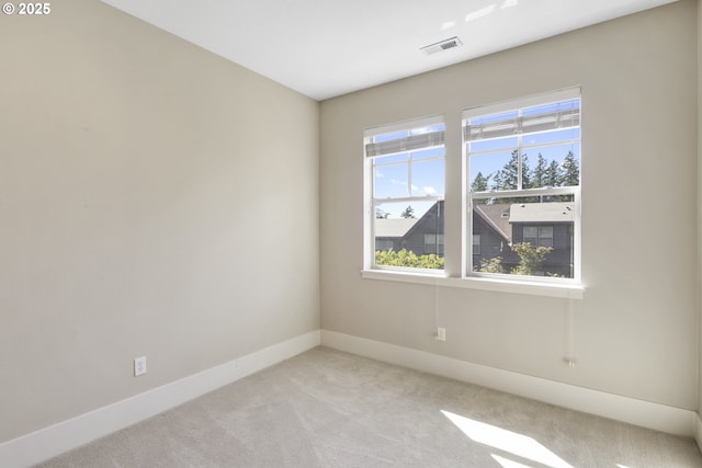 10122 SW Morrison St, Portland, OR 97225 - empty room featuring light carpet and baseboards