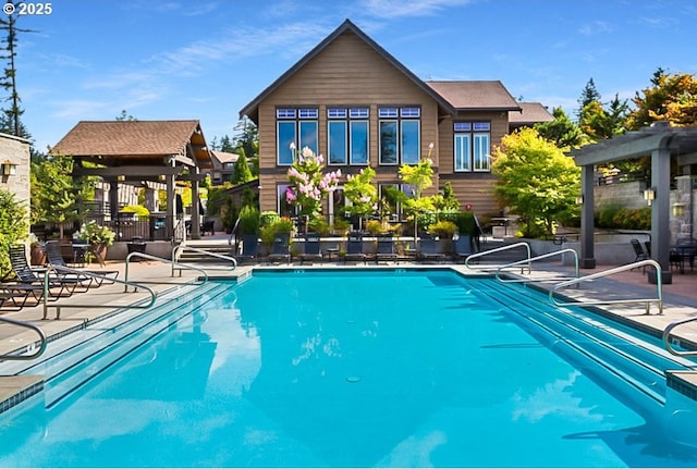 10122 SW Morrison St, Portland, OR 97225 - rear view of house with a community pool and a patio area