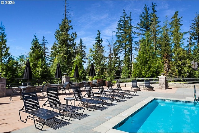 10122 SW Morrison St, Portland, OR 97225 - community pool with a patio and view of scattered trees