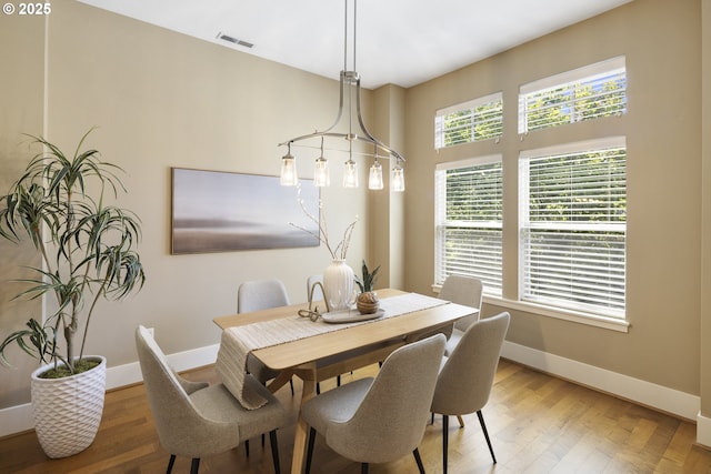 10122 SW Morrison St, Portland, OR 97225 - dining area with baseboards and light wood-style floors