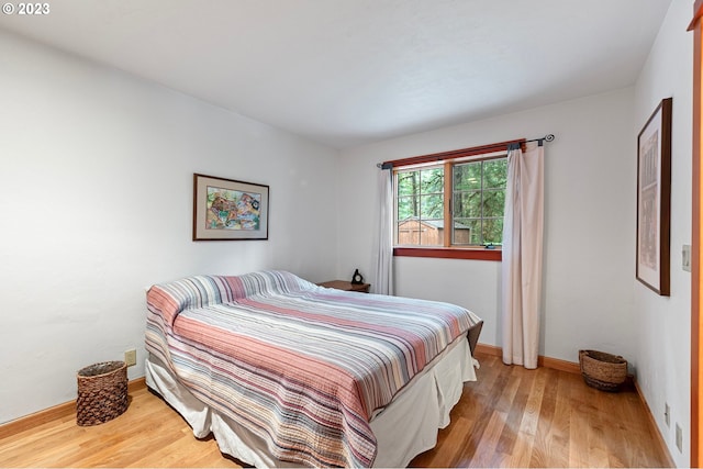 57953 Drury Ln, Blue River, OR 97413 - bedroom with wood-type flooring