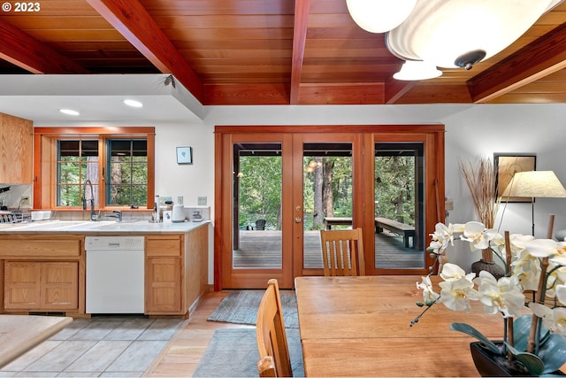 57953 Drury Ln, Blue River, OR 97413 - kitchen with a healthy amount of sunlight, white dishwasher, sink, and beam ceiling
