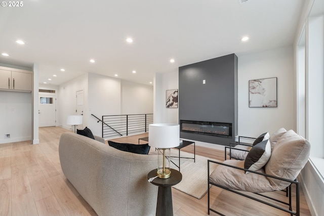 118 W 13th Way, La Center, WA 98629 - living area featuring recessed lighting, light wood-style flooring, and baseboards