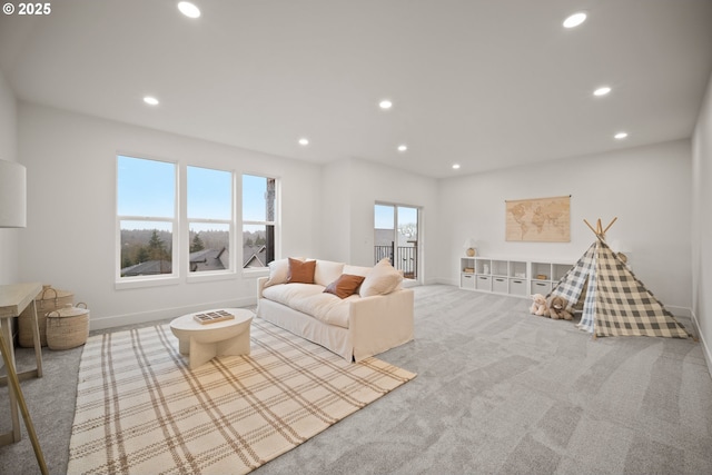 118 W 13th Way, La Center, WA 98629 - living room featuring recessed lighting, carpet, and baseboards